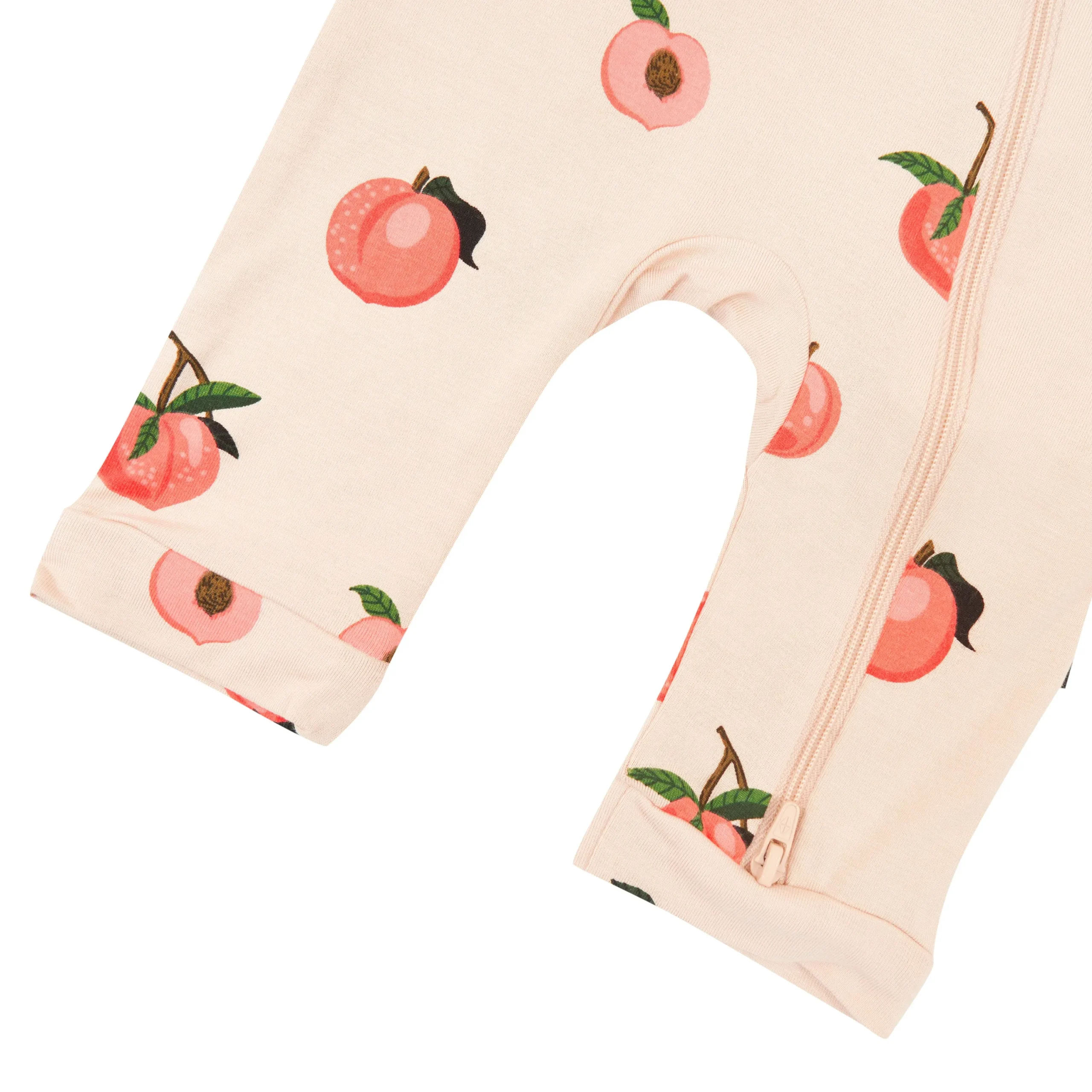 Kyte Baby Zippered Sleeveless Romper in Peach Sale